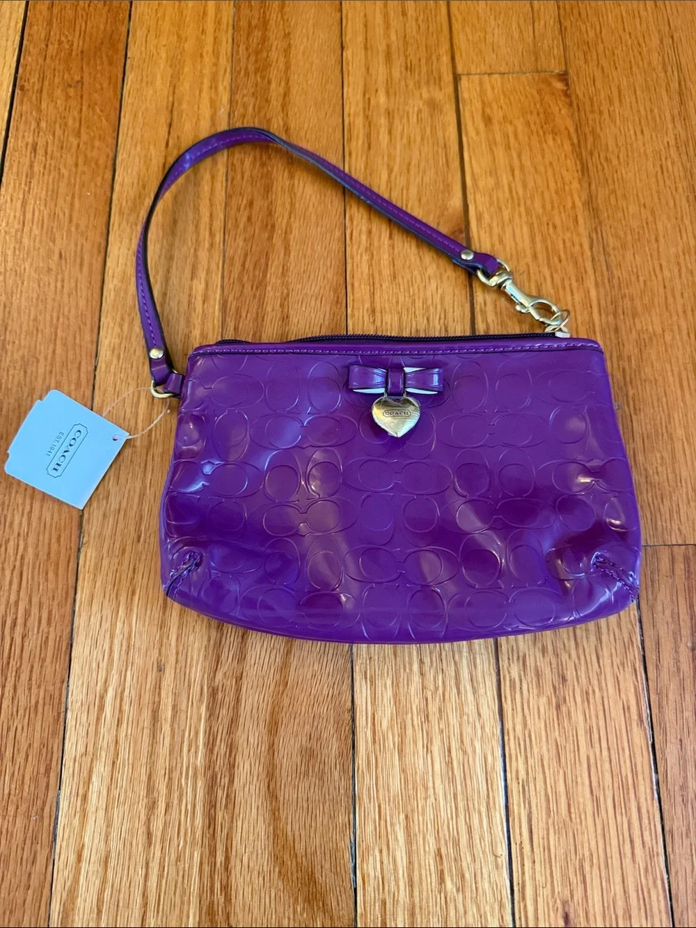Coach Patent Purple Wristlet with Gold Heart Charm
